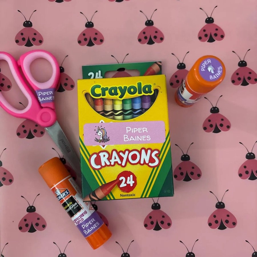 Name labels on crayons, scissors and glue stick