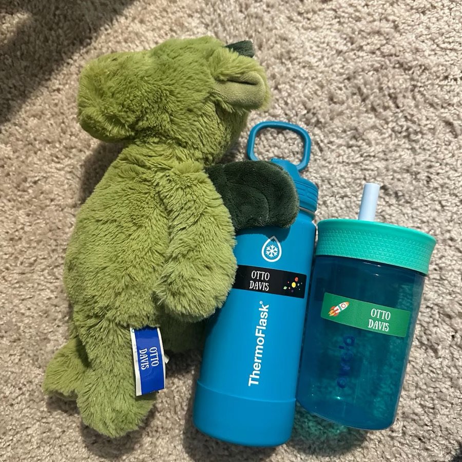 Labels on water bottles and a plush toy