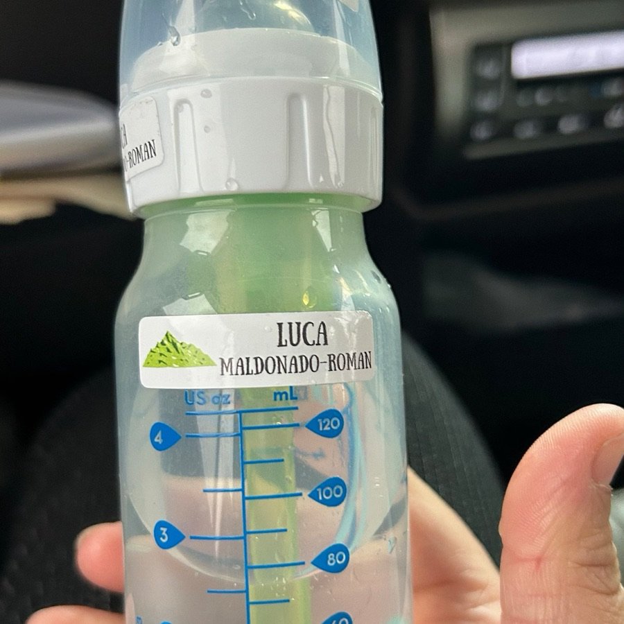 Name label on a baby bottle